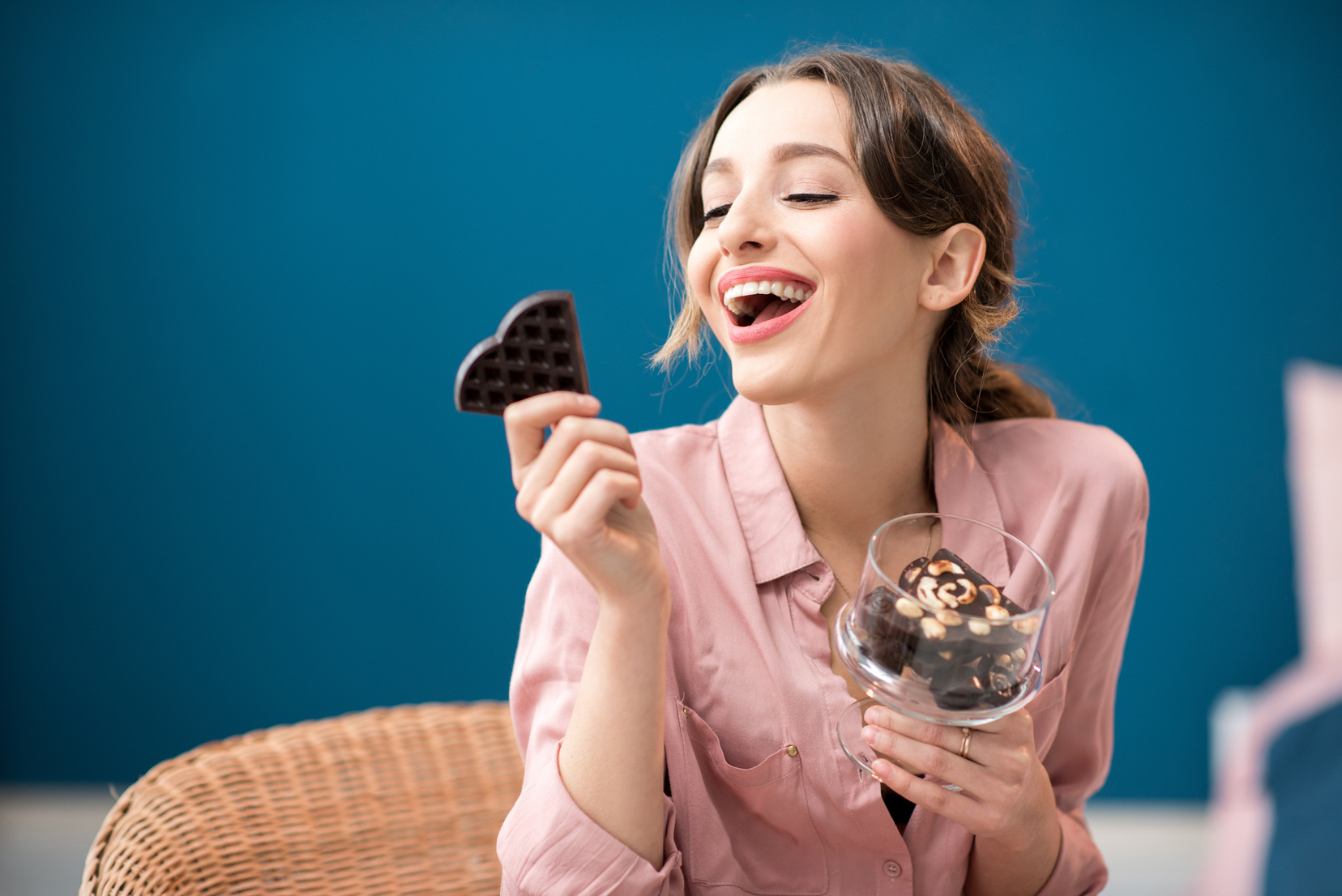Woman Enjoying a Chocolate Indoors