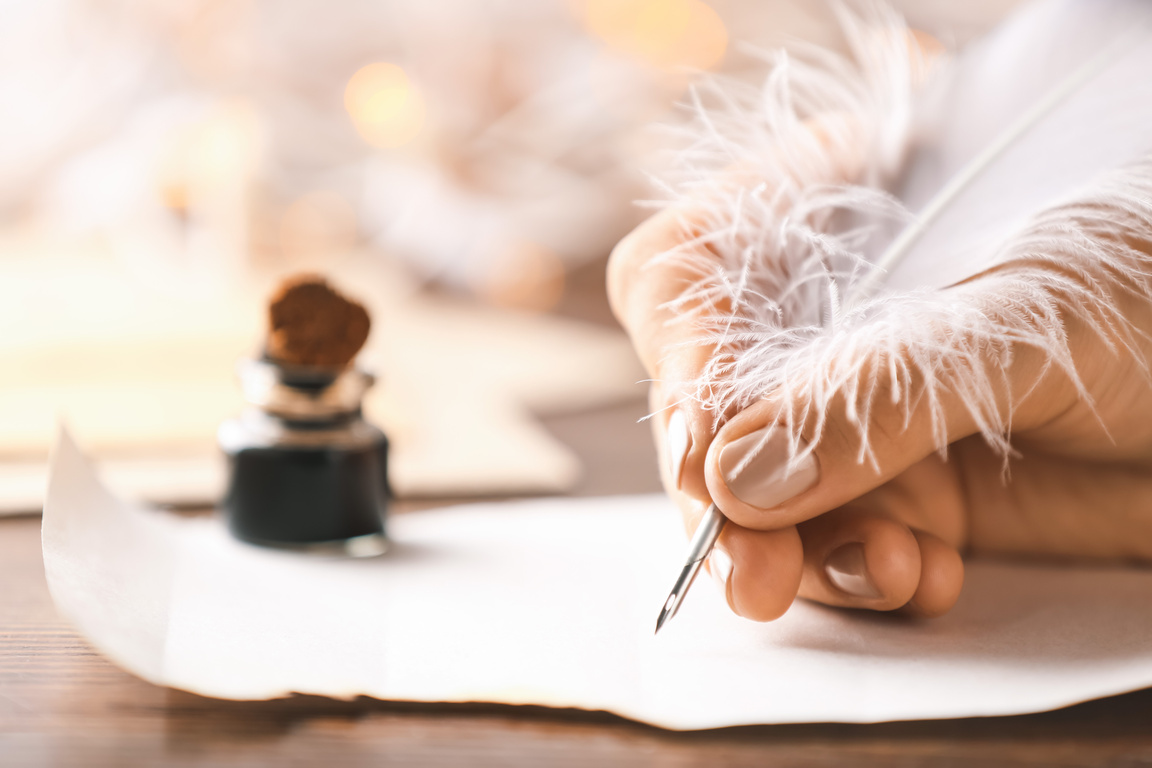 Person Writing Letter with Feather Pen